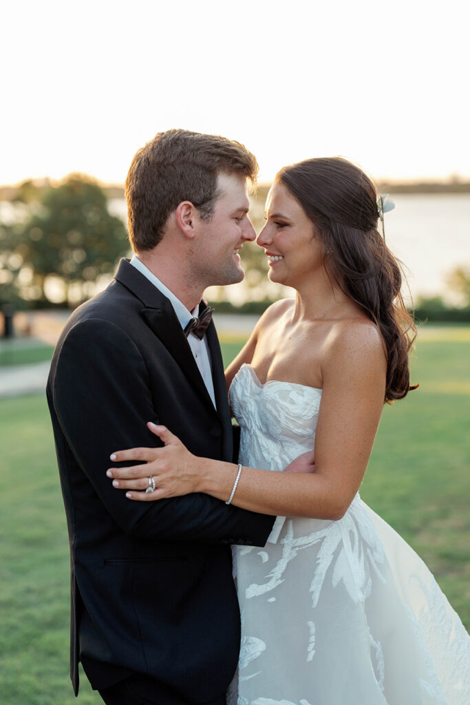 Bride and groom sharing intimate golden-hour portraits in the Dallas Arboretum gardens during spring.