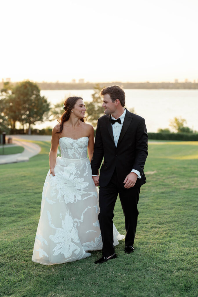 Bride and groom sharing intimate golden-hour portraits in the Dallas Arboretum gardens during spring.