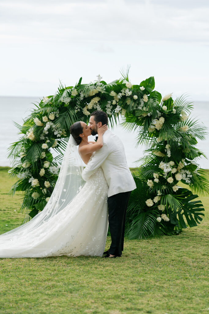 Bride and groom exchanging vows at Round Hill Resort
